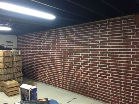 Painted brick form poured concrete basement walls with ceiling painted black | Concrete basement ...