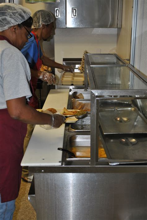 These volunteers serve a meal 5 days a week at the Salvation Army North ...