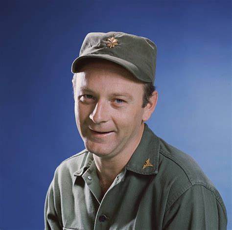 Portrait of American actor Larry Linville in costume as Major Frank ...