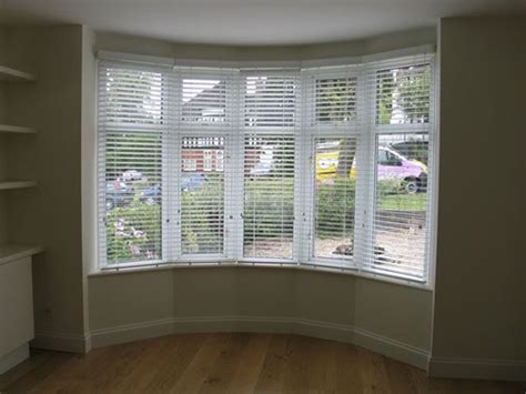 going to do this! | Bay window living room, Bay window blinds, Wooden window blinds