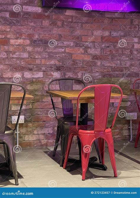 Metal Chairs Near Cafe Tables at Local Diner Stock Image - Image of wall, consumerism: 272123457