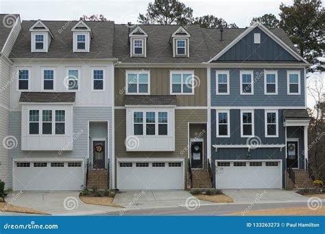 A Row of Four-story Townhouses. Stock Image - Image of modern, suburban: 133263273