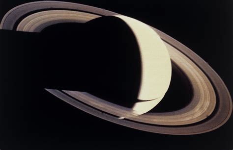 Voyager Photo Of Saturn And Its Rings Photograph by Nasa - Fine Art America