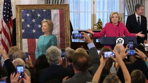 Hillary Clinton at portrait unveiling swipes at Trump, Putin