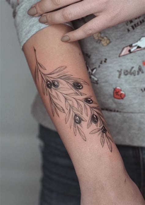 Olive Leaves Tattoo - TattooLopedia | Olive tattoo, Triangle tattoos ...