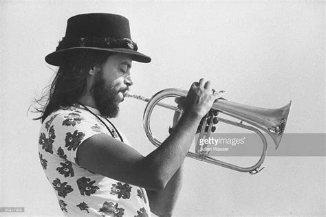 Jazz musician Chuck Mangione, playing the flugelhorn on the beach. | Chuck mangione, Jazz ...