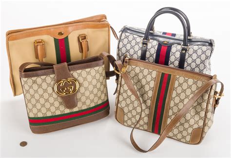 Lot 192: 4 Vintage Gucci Handbags