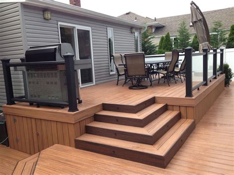 Trex Transcends Tropics Tiki Torch with Trex Black Glass Railing - Modern - Deck - new york - by ...