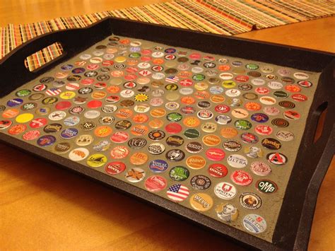 A great way to recycle bottle tops using an old tray, bottle caps, and grout. Ways To Recycle ...