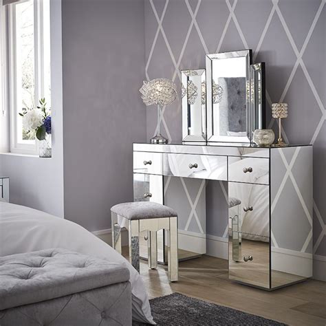 Bounce extra light around the room with sparkling glass and mirrored ...