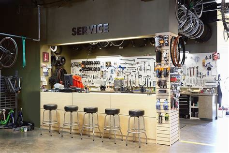 A bicycle shop and repair workshop.: | Bicycle shop, Bicycle cafe, Bicycle decor