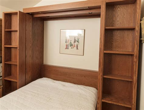 Queen Size Murphy Bed in Oak Bookcase Cabinet | EBTH