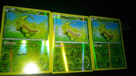 Is it just me, or is the Caterpie card in the middle is fully holo ...