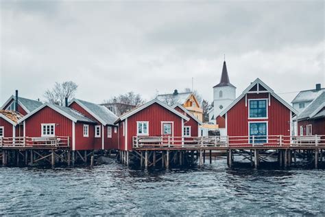 Premium Photo | Traditional red rorbu houses in reine, norway