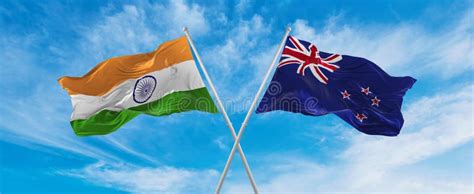 Crossed National Flags of India and New Zealand Flag Waving in the Wind ...