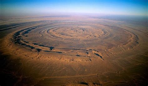 This formation, called "the eye of the Sahara", has mystified geologists for decades : r/pics