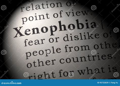 Definition of xenophobia stock image. Image of dictionary - 95732839