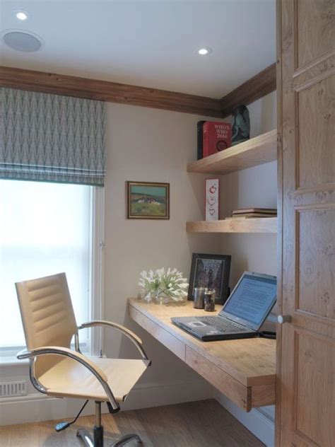 Small Yet Comfy Working Nook With Floating Shelves And A Desk With Drawers | Home office design ...