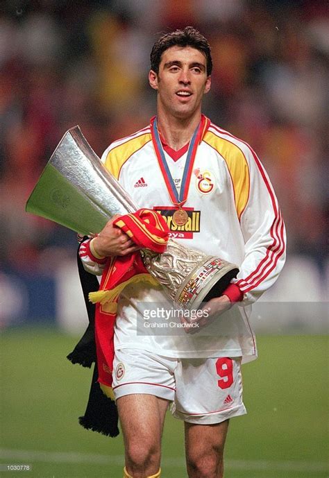 Hakan Sukur of Galatasaray celebrates with the trophy after beating ...