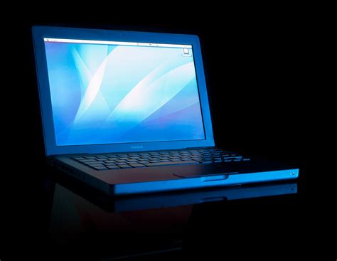 Macbook | Macbook laptop reflected on a black background PER… | Flickr
