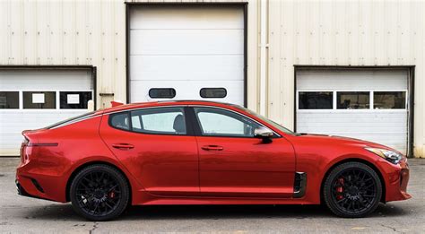 Hichroma Red Kia Stinger GT2 AWD with 19” XO Luxury Phoenix