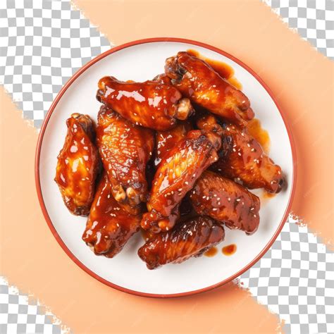 Premium PSD | A plate of chicken wings with a plate of chicken wings.