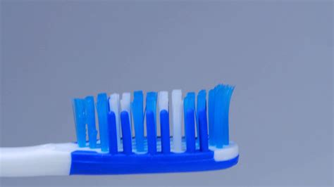 Macro Close Up Putting Blue Toothpaste On Stock Footage SBV-311535213 ...