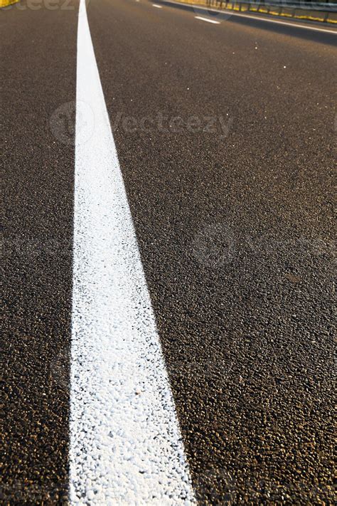 road markings on the asphalt 9547445 Stock Photo at Vecteezy