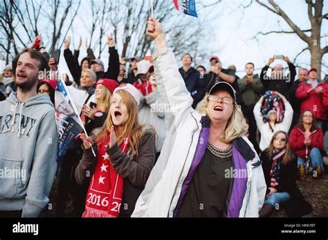 Trump supporters cheer as they listen to the National Anthem during the ...