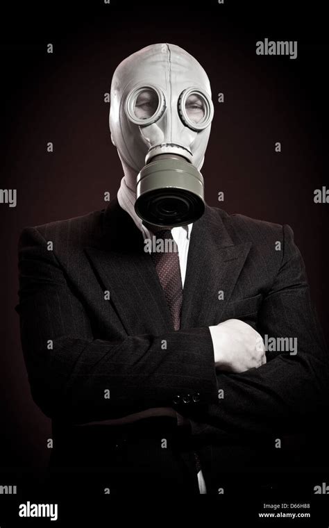 person in a gas mask on a dark background Stock Photo - Alamy