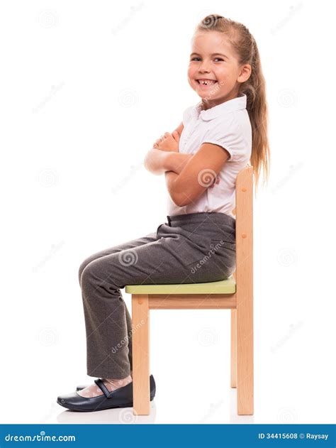 Little Girl Sitting on a Chair and Smiling Stock Photo - Image of portrait, smile: 34415608