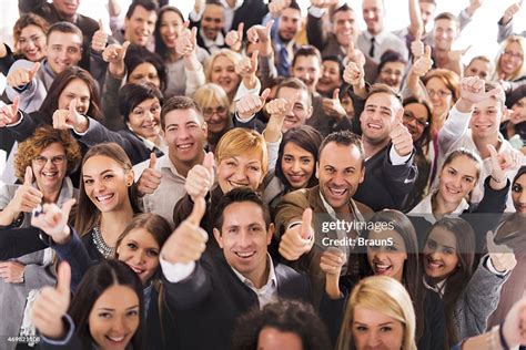 Large Group Of People Smiling And Giving Thumbs Up High-Res Stock Photo - Getty Images