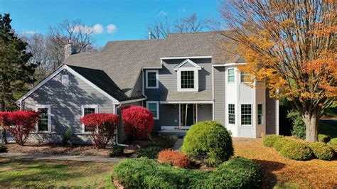 James Hardie Siding Installation With New Doors, Windows & Stone - C&C Plastering