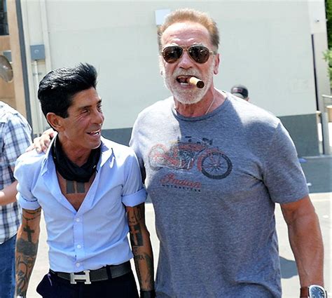 Arnold Schwarzenegger Leaves A Hair Salon While Smoking A Cigar ...