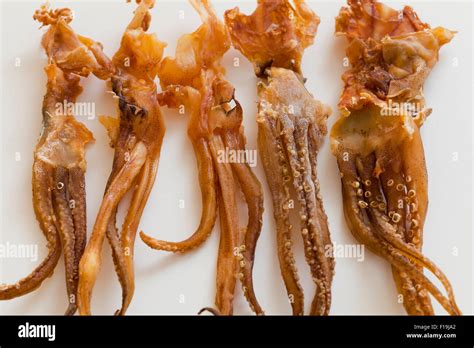 Japanese dried squid snack Stock Photo - Alamy