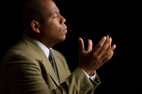African-American Man Praying - Easter Hill United Methodist Church