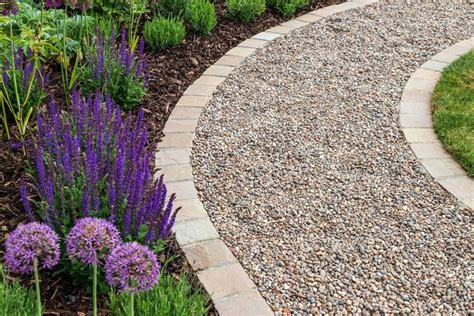 How to Lay a Budget-Friendly Gravel Path | Gravel landscaping, Pea gravel garden, Gravel path