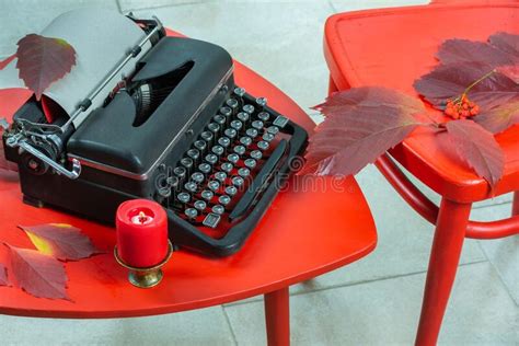 Old Typewriter on a Red Table with Red Chairs Stock Photo - Image of ...