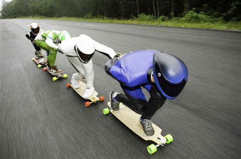 longboarders on road