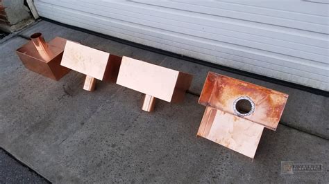 Custom copper scupper boxes with outlets