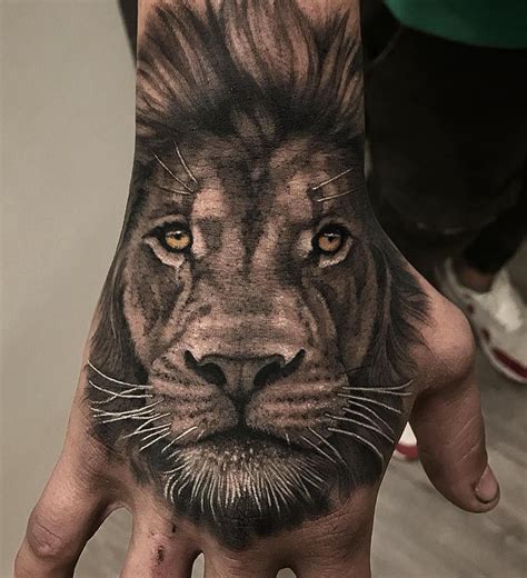 Tattoos | Lion head tattoos, Lion hand tattoo men, Lion hand tattoo