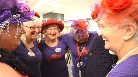 'The power of fun': Red Hat Society brings queens and bling to the Queen City | CBC News