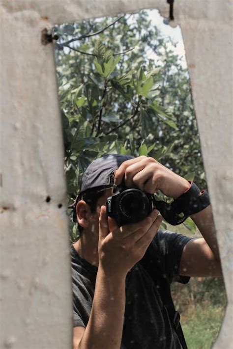 Reflection of a Person on Mirror · Free Stock Photo