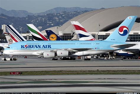 several airplanes are parked on the tarmac in front of an airport ...