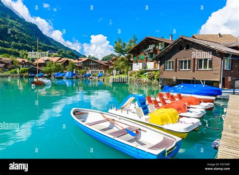 Village Iseltwald at Lake Brienz - beautiful lake in the alps at ...