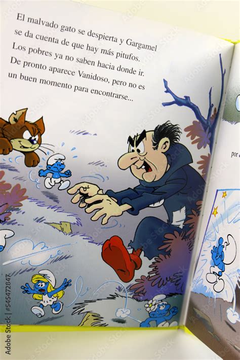 Fotka „The Smurfs storybook. The wizard Gargamel and his cat Azrael in his castle. Gargamel ...