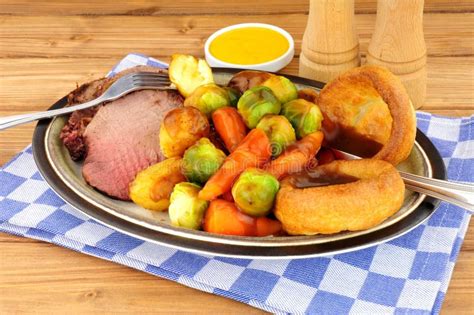 Roast Beef Meal in Yorkshire Pudding Stock Photo - Image of carrots, place: 108029062