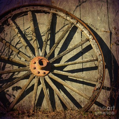 Old West Wagon Wheel Photograph by Betty LaRue