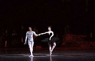 Ulyana Lopatkina and Danila Korsuntsev dancing the Black Swan pas de deux in Swan Lake ...