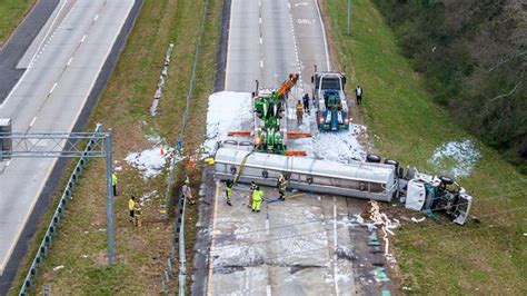 Tanker carrying 7,500 gallons of gas overturns after interstate crash ...